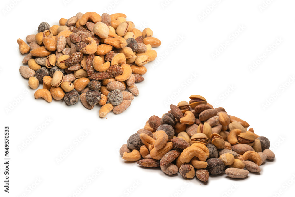 A group of almonds, pistachios, walnuts, macadamia, cashews. A group of almonds, pistachios, walnuts, macadamia, cashews.
