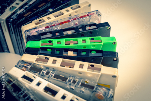 background with old audio cassettes of various colours