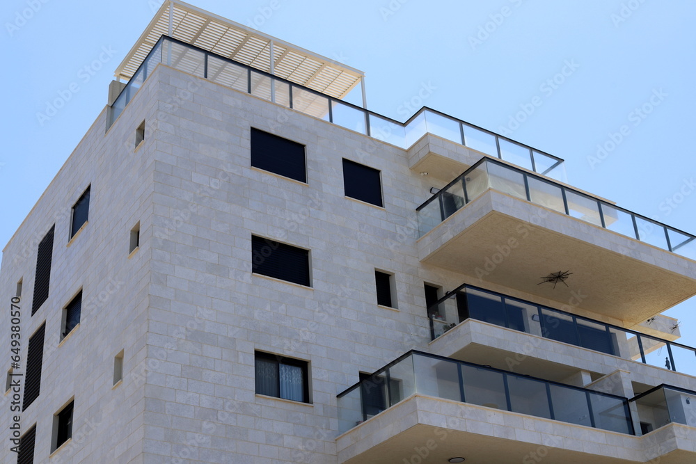 External balcony on the facade of a residential building. External balcony on the facade of a residential building.