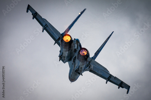 Fotografie Military fighter jet plane at air base