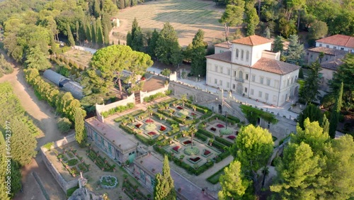 4K aerial - a bird's eye view video (Ultra High Definition) of Villa Caprile. Green morning scene of Italian countryside, Province of Pesaro and Urbino, Italy, Europe. photo