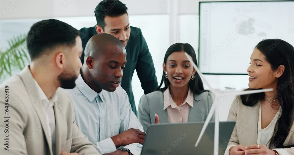 Business people, windmill and laptop for team discussion or meeting for proposal or planning. Diversity, renewable energy or men and women talk technology development, collaboration and innovation