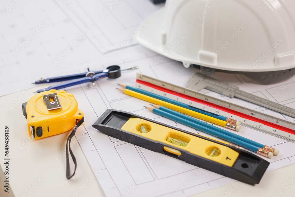 A home architect is reviewing a draft house plan. Projects assigned by customers and customized design before delivery Interior design and decoration ideas, African American, Indian A home architect is reviewing a draft house plan. Projects assigned by customers and customized design before delivery Interior design and decoration ideas, African American, Indian