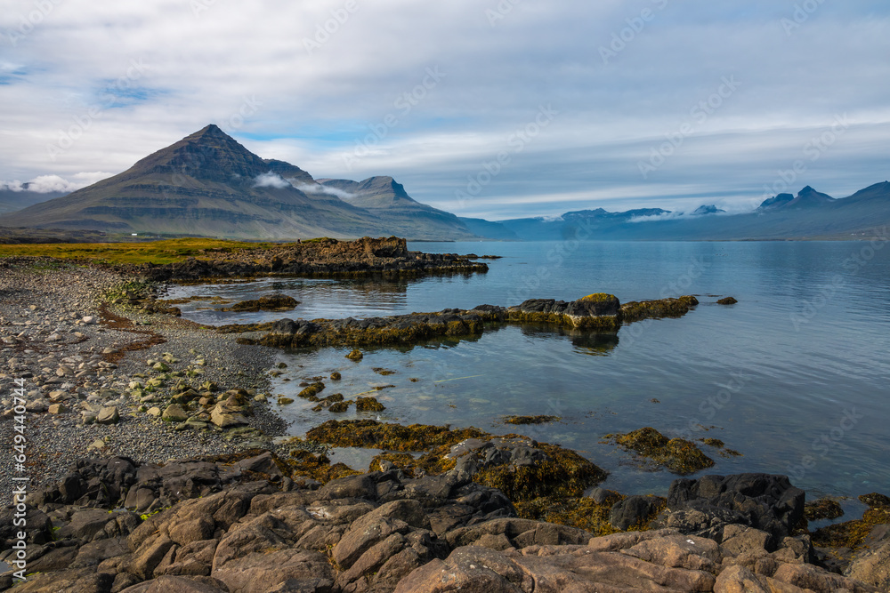 Stunning coastal scenery with volcanic rock in the foreground, Djúpivogur, Berufjörður,  Austurland, East Fjords, Eastern Iceland