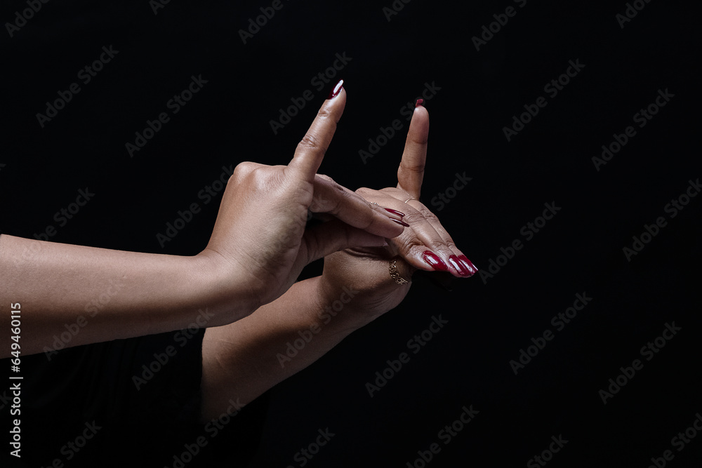 Hand gestures with two hands isolated on black background