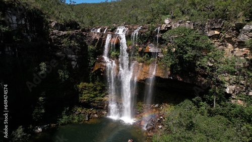 aerial view of the Cachoeira do Cordovil waterfall in Chapada dos Veadeiros Goiás Brazil green water, sunny day, waterfall, rocks and vegetation of the cerrado