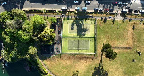 Aerial view over a tennis court and street in Dunmore East, Ireland 4k photo