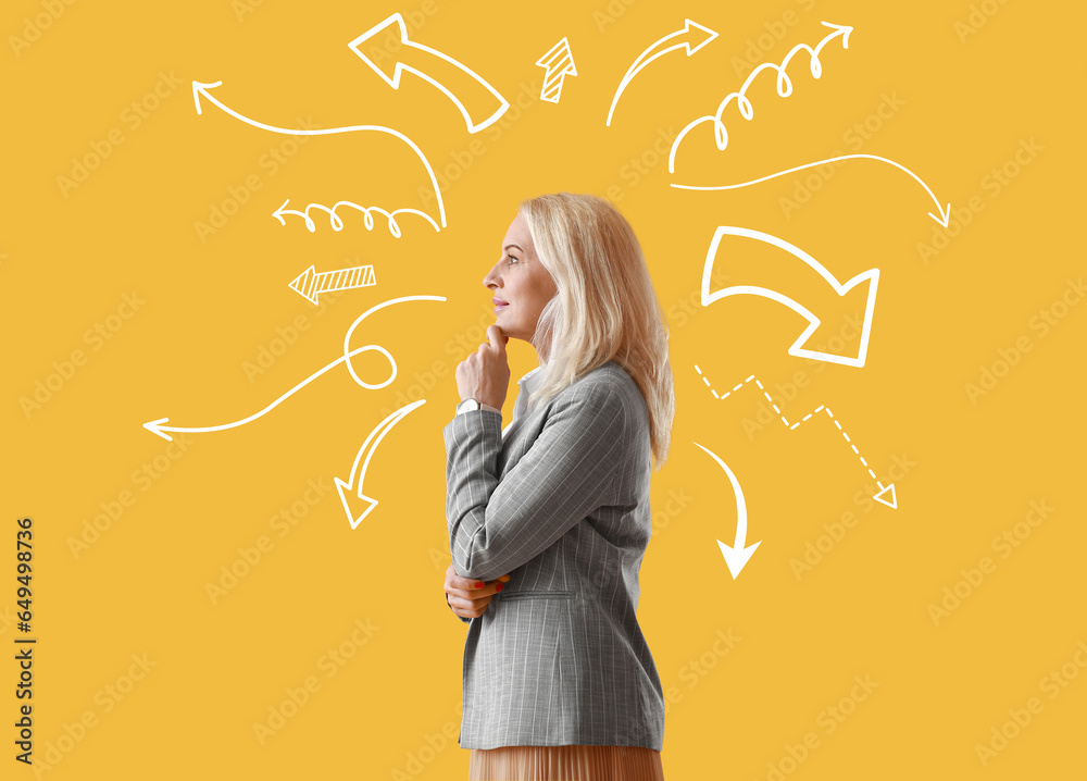 Ταπετσαρία Thoughtful mature businesswoman on yellow background