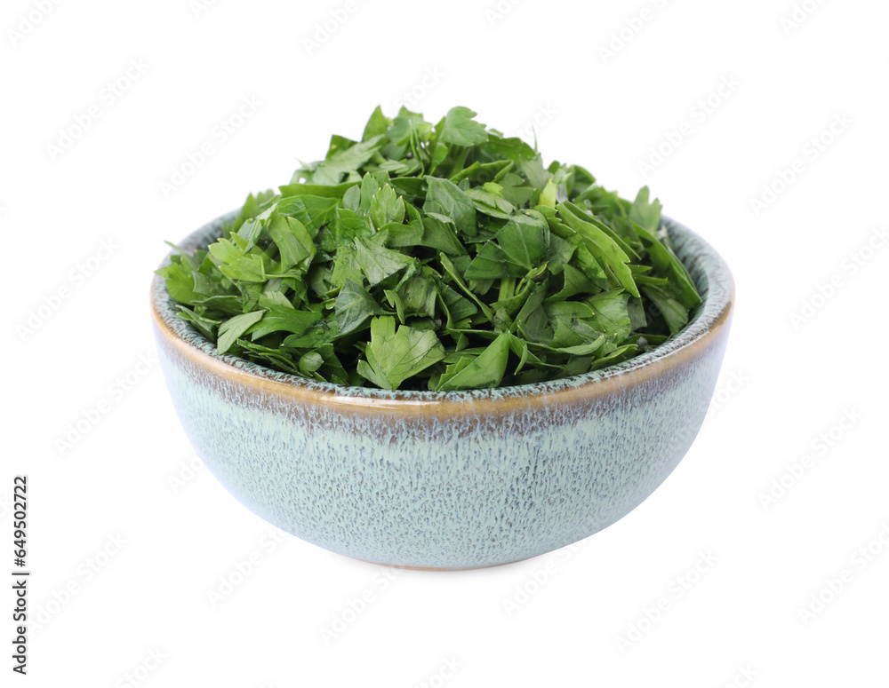 Chopped parsley leaves in bowl isolated on white Chopped parsley leaves in bowl isolated on white
