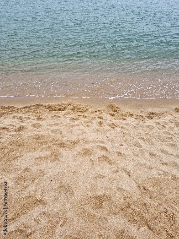 Soft beautiful ocean wave on sandy beach. Background Soft beautiful ocean wave on sandy beach. Background