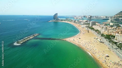 Drone Barceloneta beach. Aerial view of Barcelona coast. travel  destination in Spain. Summer in Mediterranean tourism attraction in Europe. Luxury hotels, modern apartments, yacht harbor. photo