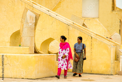 Woman tourist at the Jantar Mantar observatory, Jaipur, UNESCO World Heritage Site, India. photo