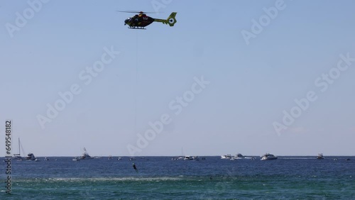 Queensland Eurocopter EC-135P-2 Helicopter demonstrates life-saving rescue at Gold Coast Pacific Airshow. photo