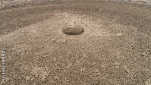 Mud volcano bledug kuwu. aerial view volcanic plateau with geothermal activity and geysers, Indonesia java. aerial view volcanic landscape photo