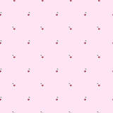 Seamless pattern of hand-drawn cherries on a pink background. cute pattern for printing on scrapbook fabrics and wrapping paper