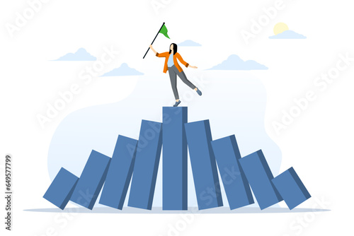 winner takes all concept, survival in business competition or strength to overcome difficulties, economic crisis, business winner, successful businessman standing strong domino collapse bar graph.