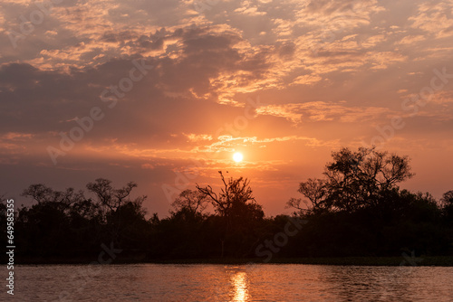 Beautiful sunset clouds and landscape by Pixaim River, Pantanal