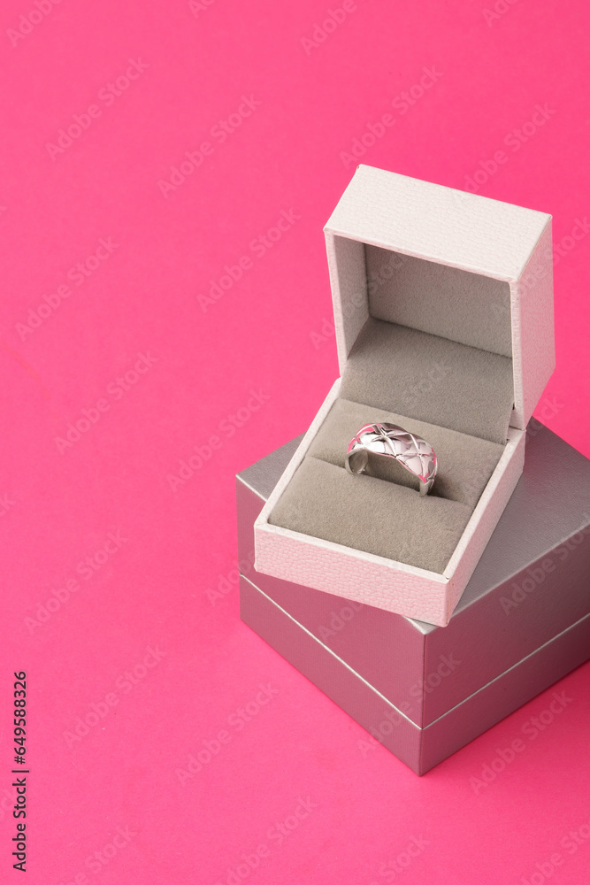 Small jewelry box on pink studio background Small jewelry box on pink studio background