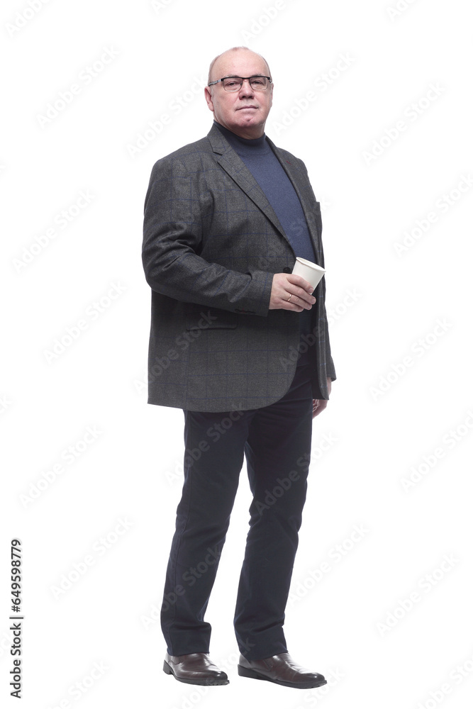 in full growth. confident business man with coffee to take away. in full growth. confident business man with coffee to take away.