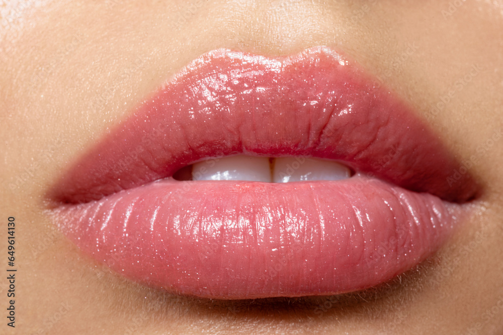 Plump woman's lips with natural makeup and white teeth. - obrazy, fototapety, plakaty 