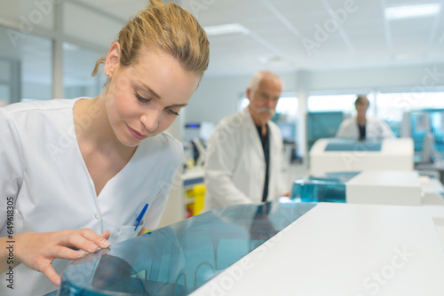 young woman technician in a scientific laboratory