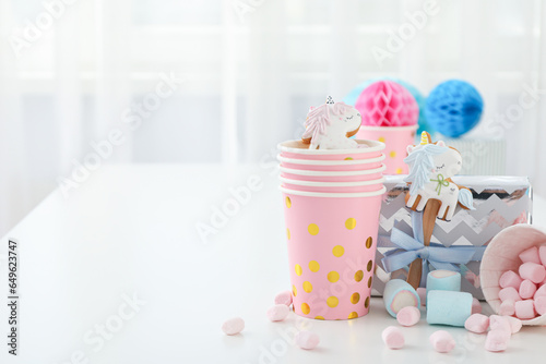 Fototapeta Naklejka Na Ścianę i Meble -  Gift boxes, marshmallows and paper cups on white background, space for text
