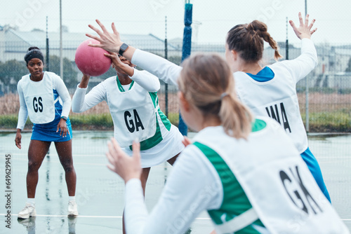 Photos Netball sports team, game ball and women defend, attack and pass in community competition, practice and game