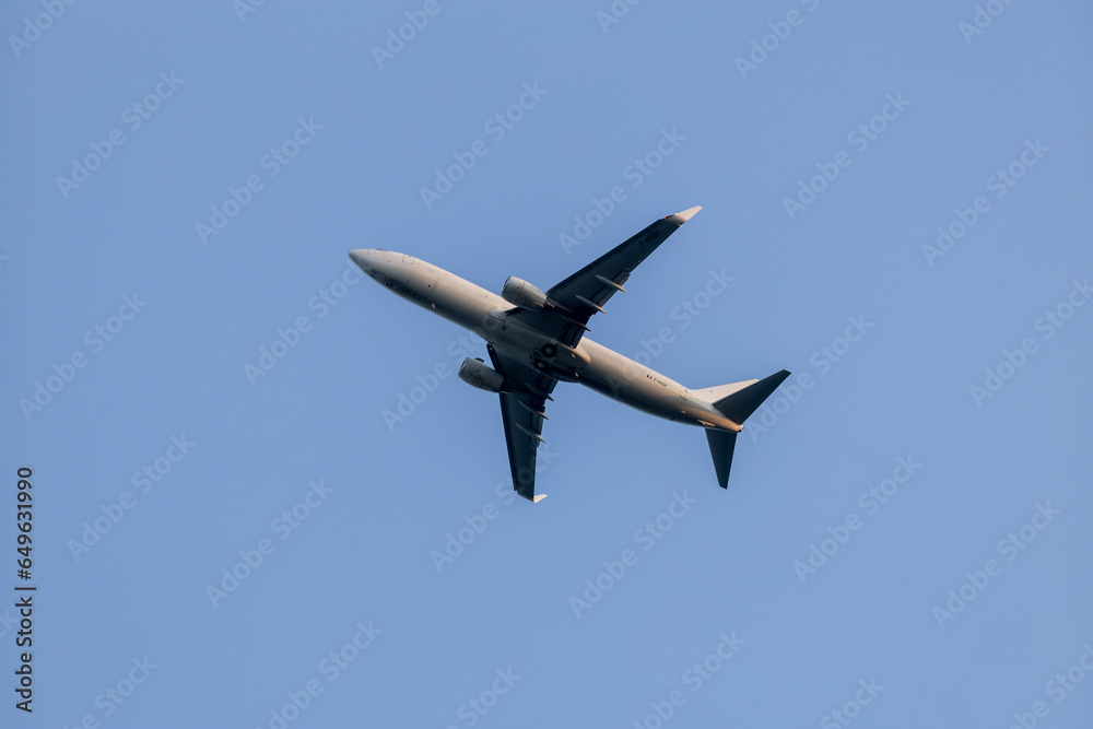 Fototapeta premium Silhouette and blue sky of an airplane