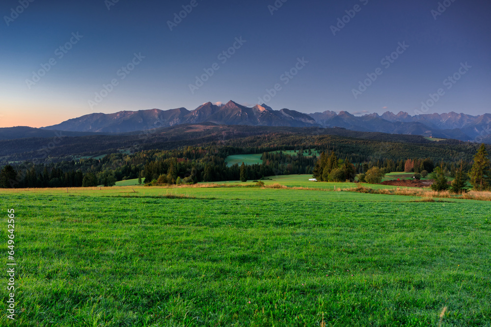 Beautiful panorama of Tatra mountains before the sunrise, Lapszanka. Poland