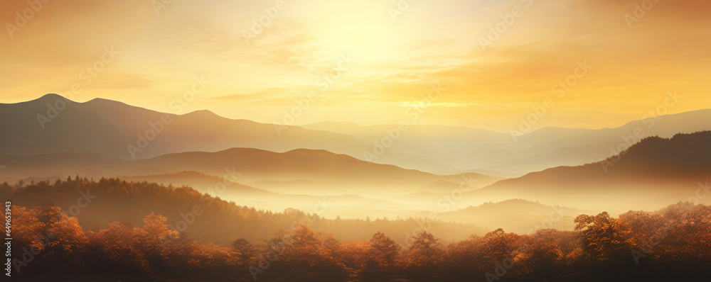 Beautiful autumn forest scene . Colorful morning view on foggy mountains and clouds at sunrise time. Beauty of nature concept background.