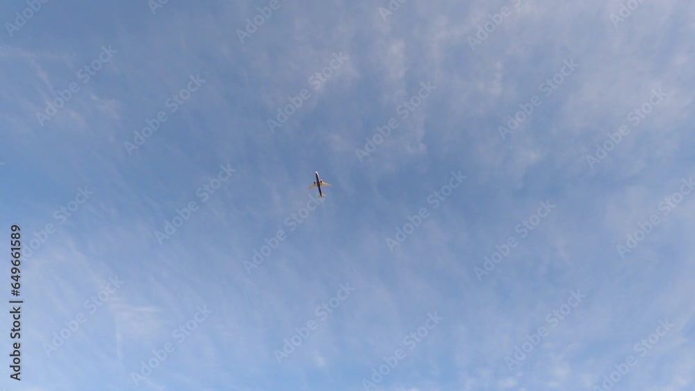 Airplane on blue sky background with clouds Airplane on blue sky background with clouds