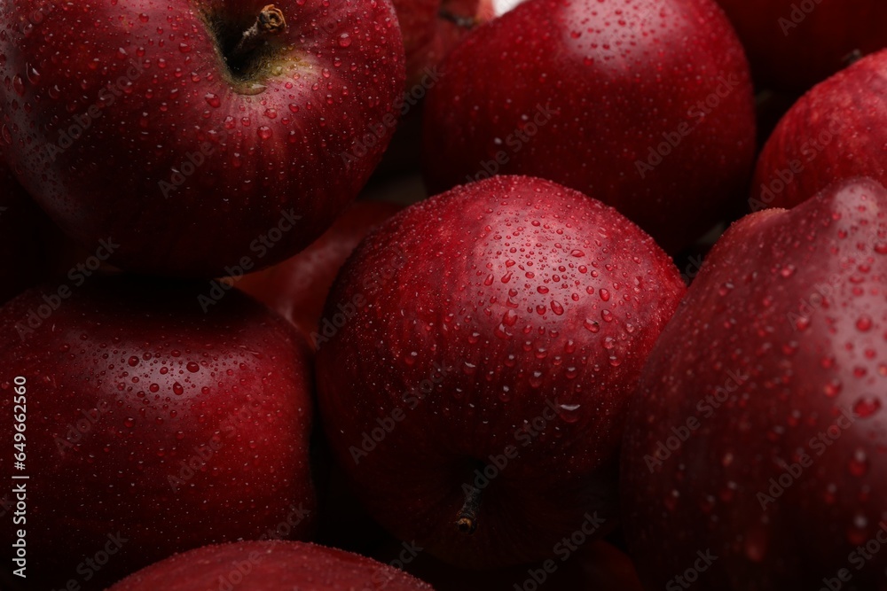 Fresh red apples with water drops as background, closeup Fresh red apples with water drops as background, closeup