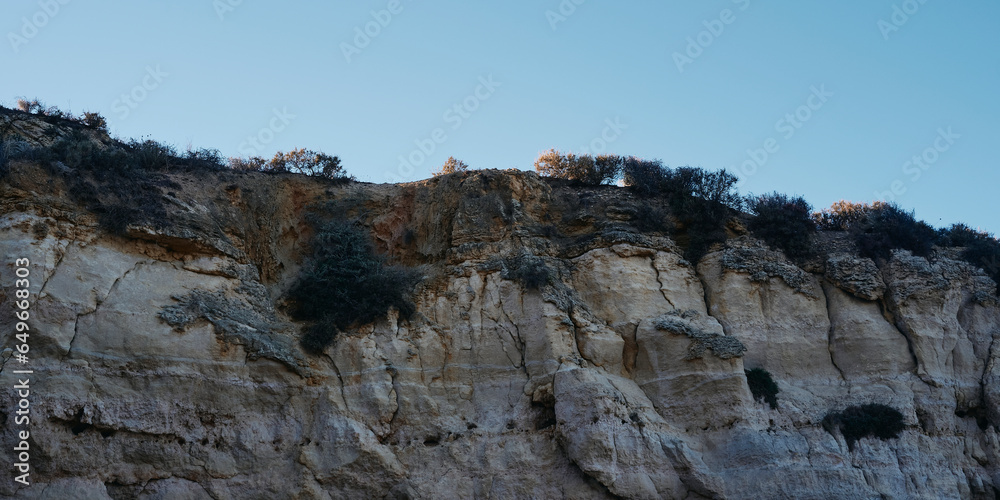 Cliffs by the coast of Algarve, Lagos, Portugal, the summer of 2023.