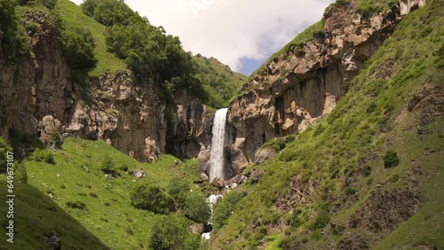 Arsha waterfall in Kazbegi region, Georgia photo