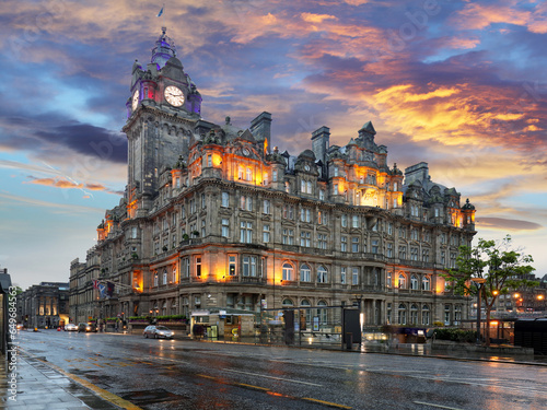 Scotland - Edinburgh at sunset on Princess street and Balmoral hotel on background photo