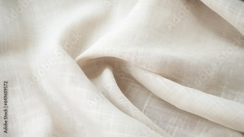 Organic linen fabric with a subtle natural weave pattern, beige color. Texture for background or backdrop. 
