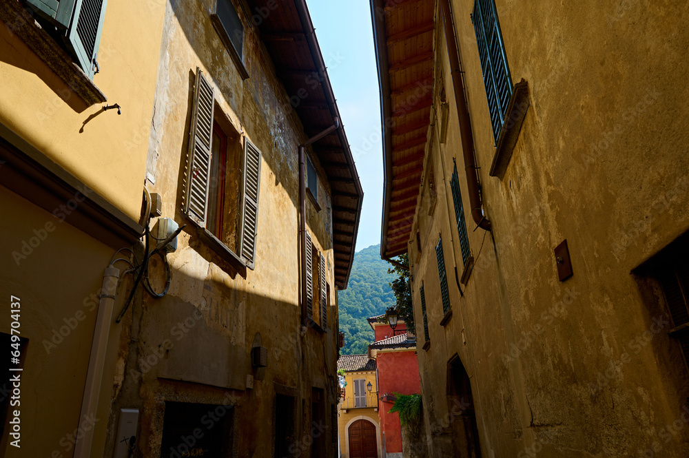 Italy, Lombardia, Canzo, narrow alley at historic old town. Street scene. Tourism. Adventure. Journey. Trip. Travel