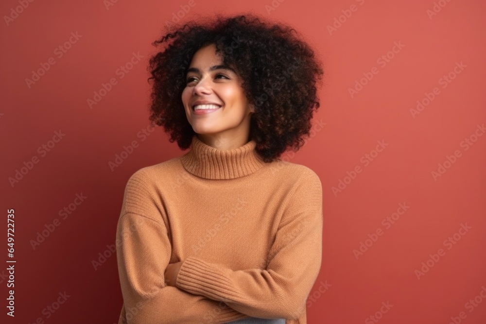 medium shot portrait of a confident Mexican woman in her 30s wearing a cozy sweater against an abstract background medium shot portrait of a confident Mexican woman in her 30s wearing a cozy sweater against an abstract background