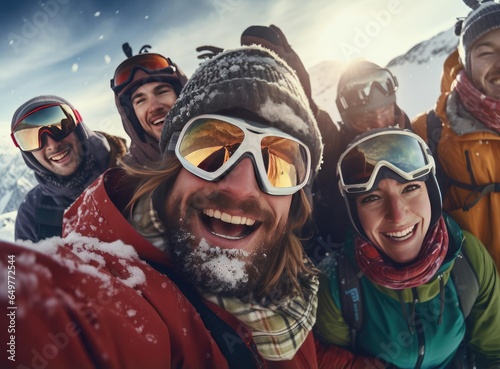 A group of skiers and snowboarders