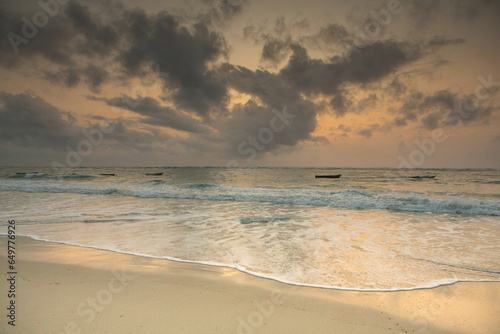Fototapeta Naklejka Na Ścianę i Meble -  Paradise beach with white sand and palms. Diani Beach at Indian ocean surroundings of Mombasa, Kenya. Landscape photo exotic beach in Africa