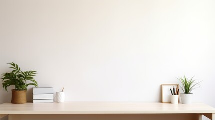 Workspace - office table, empty desk with supplies against the white wall, copy space for text or product showcase
