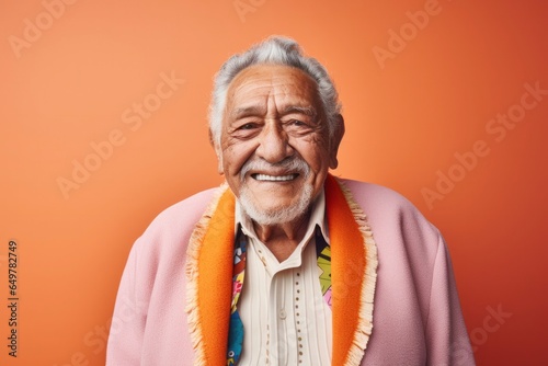 Obraz na płótnie Happy senior man with beard smiling in studio portrait w salonie