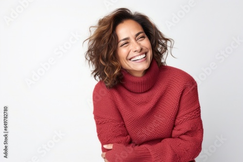 Obraz na płótnie Cheerful woman with curly hair smiling against white background w salonie