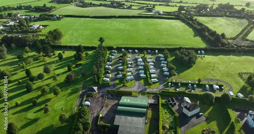 Drone view of a caravan campsite at sunset 4k