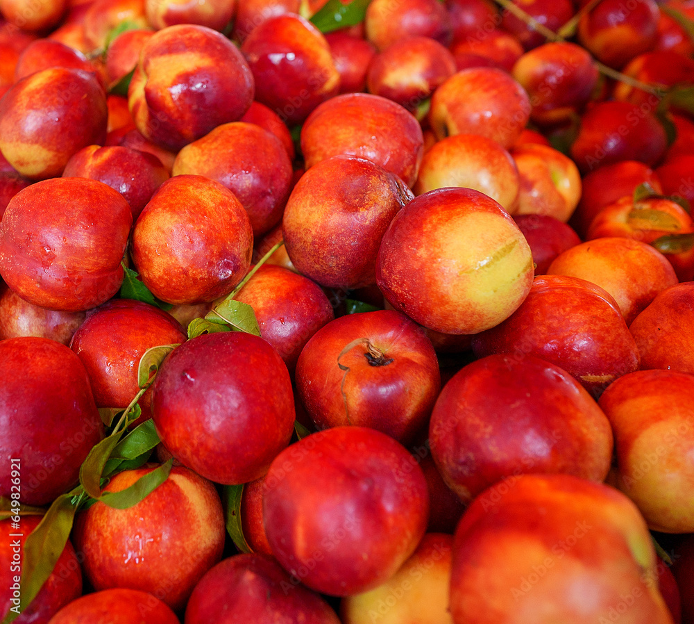 Lots of eco friendly nectarines in the city market. Lots of eco friendly nectarines in the city market.