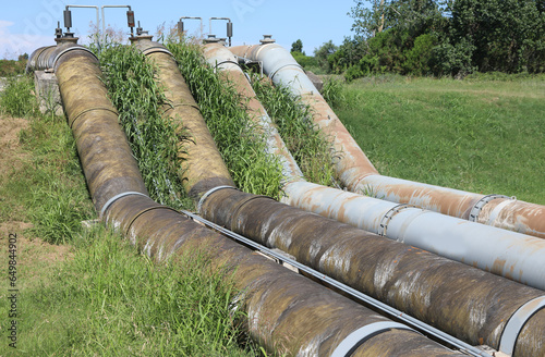 Four very giant pipelines of penstock of a dewatering pump photo