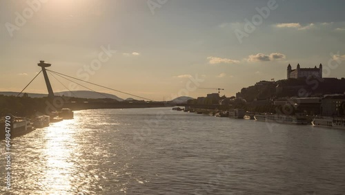 Bratisalva slovakia city skyline aerial view time lapse river and brdige bratislava city. photo