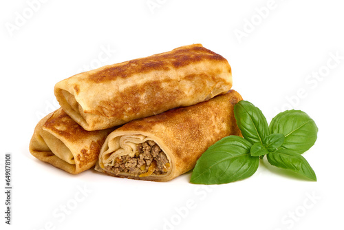 Savory pancake rolls stuffed with ground meat, isolated on white background. High resolution image. photo