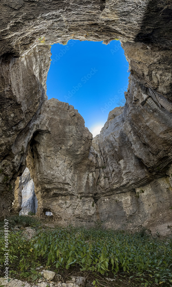 Sky view and mystical texture from inside the cave