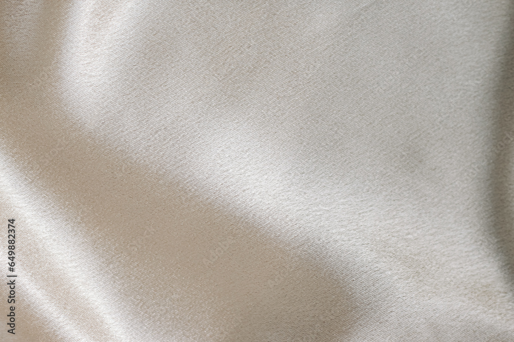 Fototapeta premium Silvery smooth silk texture of beauty silk